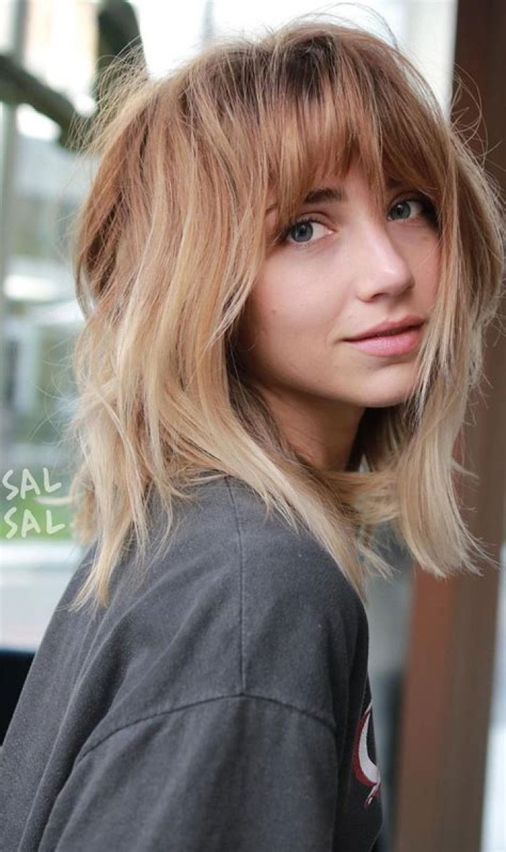 Medium Length Low Maintenance Shaggy Haircut with Bangs: The Ultimate Guide