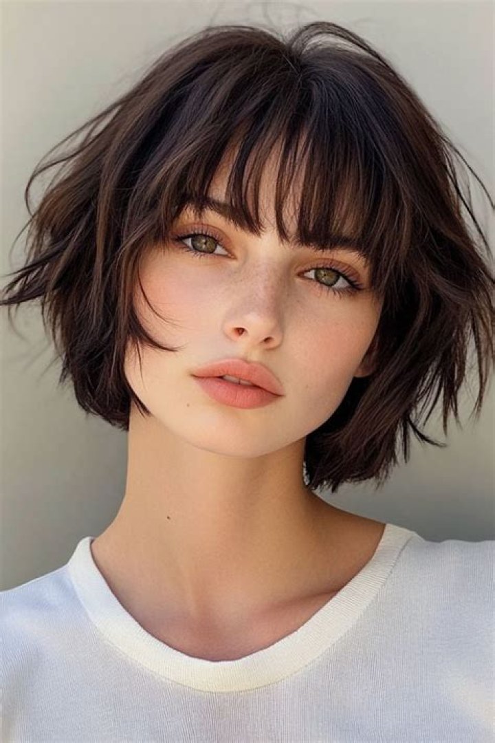 Embrace the Elegance: Discover the Alluring Charm of Short Hairstyles with Wispy Bangs
